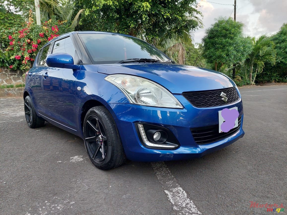 2004' Suzuki Swift photo #2