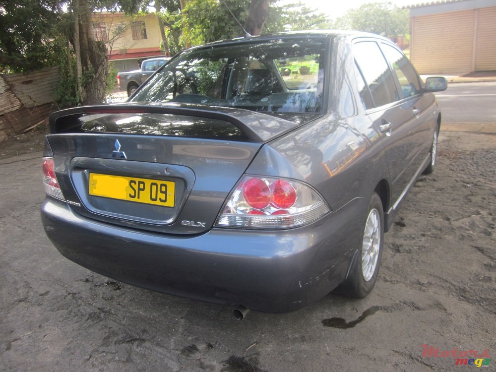 2009' Mitsubishi Lancer GLX LUXURY photo #3