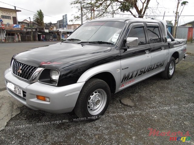 2004' Mitsubishi L200 photo #1