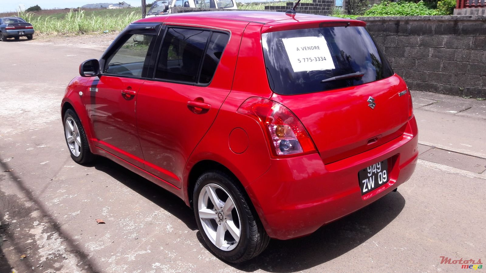 2009' Suzuki Swift Japan photo #1