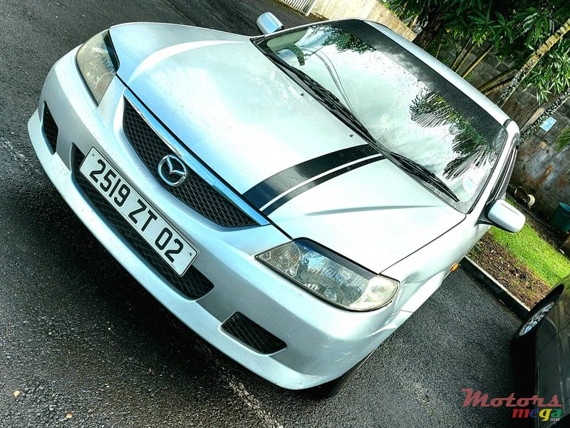 2002' Mazda 323 photo #4