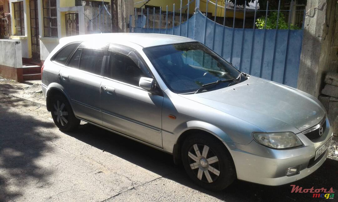 2003' Mazda 323 photo #1