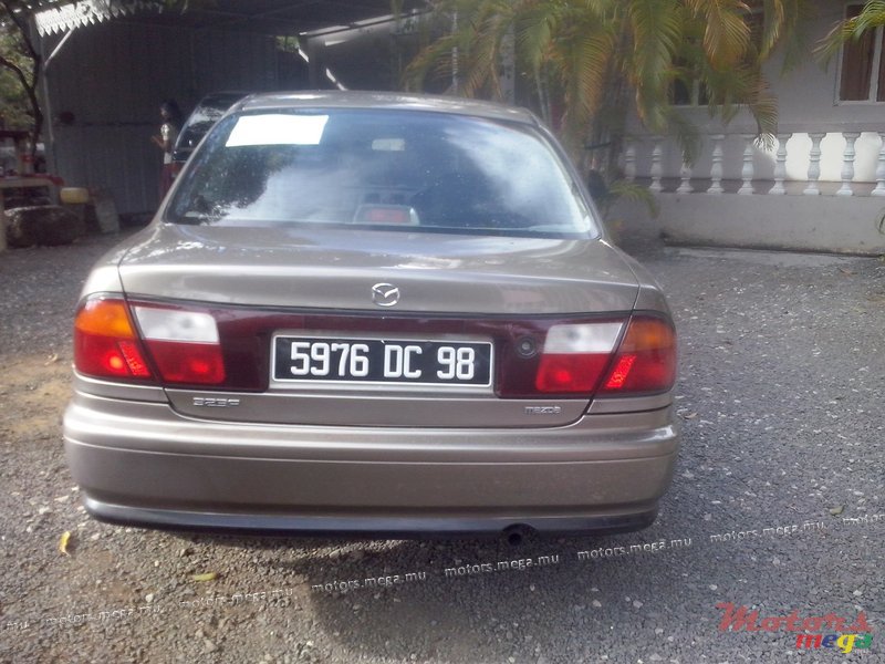1998' Mazda 323 photo #1