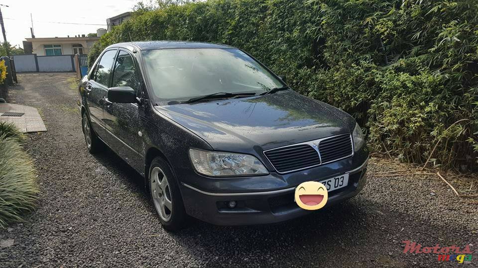 2003' Mitsubishi Lancer 1590 photo #1