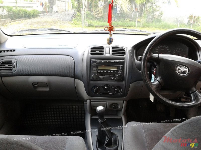 2004' Mazda 323 photo #3