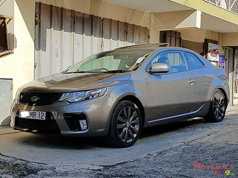 2012' Kia Koup automatic photo #2