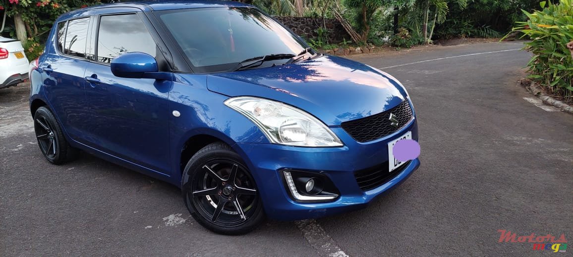 2004' Suzuki Swift photo #4