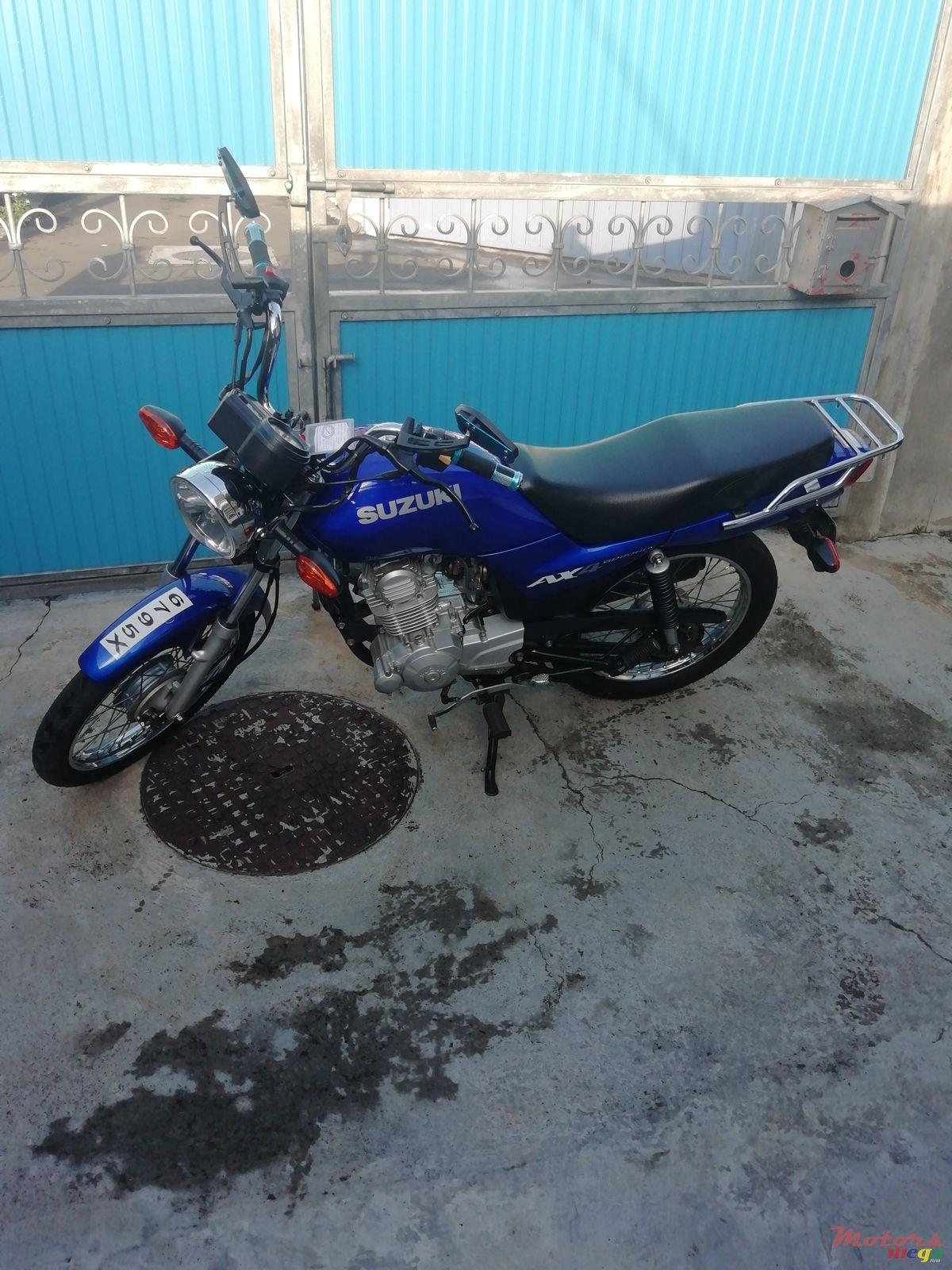 2013' Suzuki Ax100 photo #1