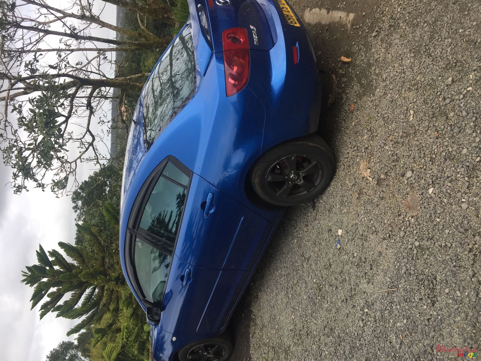 2004' Mazda 3 photo #1