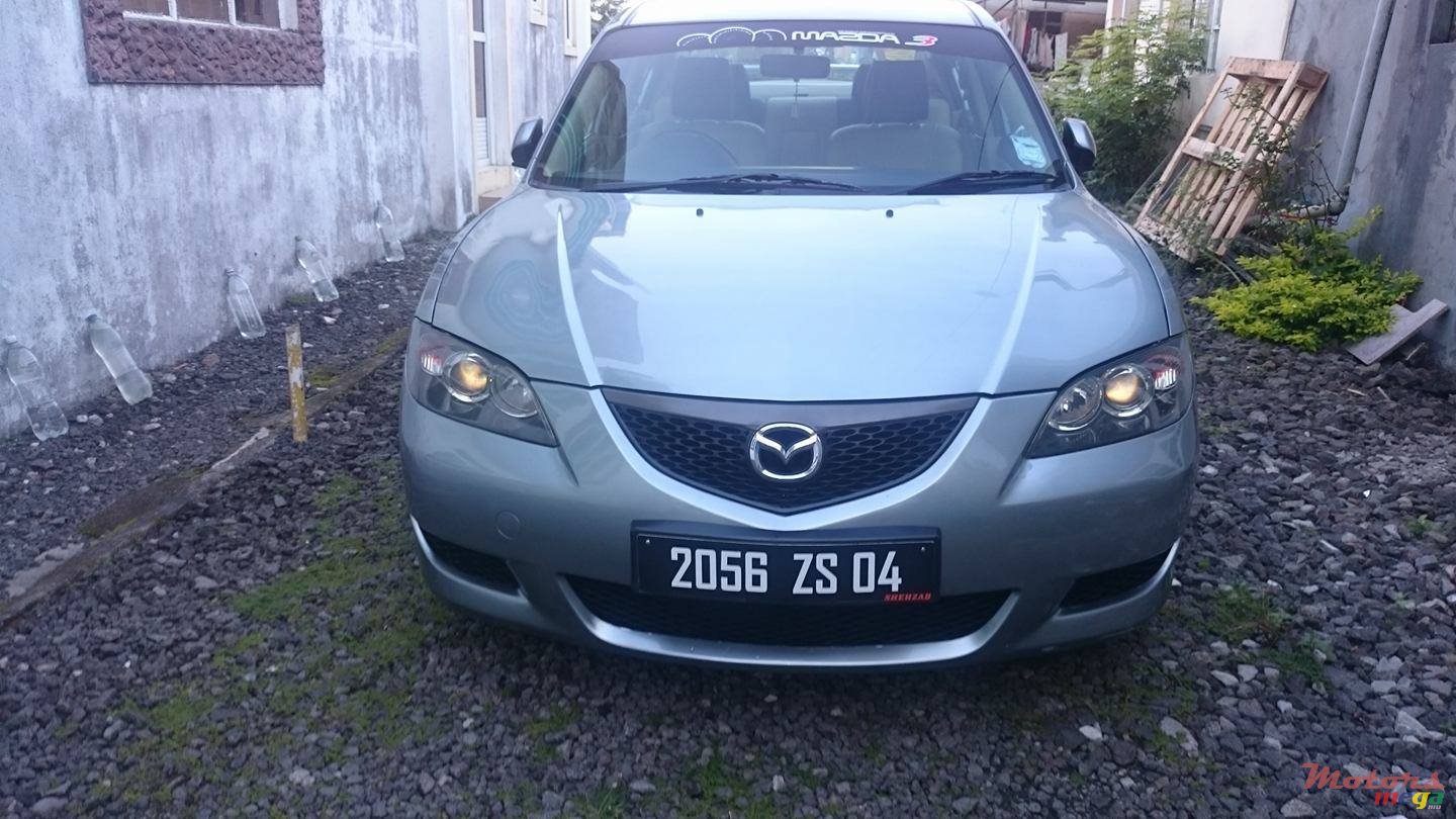 2004' Mazda 3 photo #1