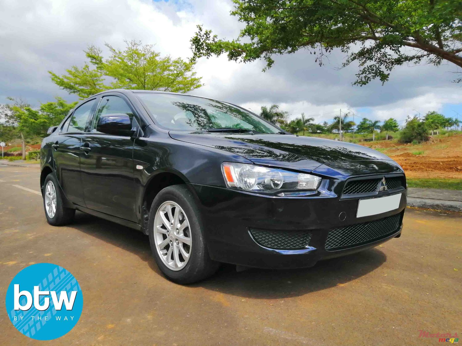 2014' Mitsubishi Lancer photo #1