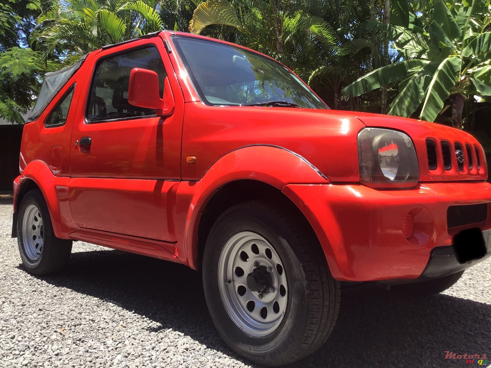 2003' Suzuki Jimny photo #1