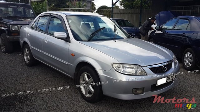 2002' Mazda 323 photo #1