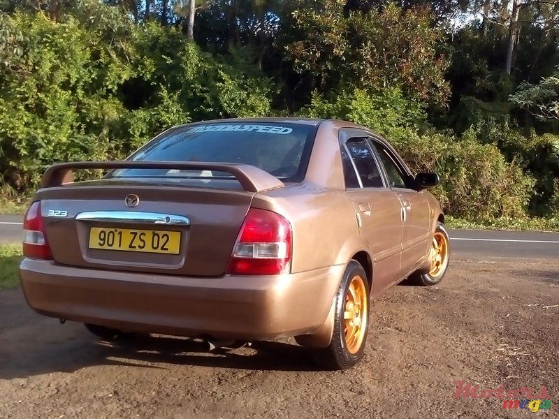 2002' Mazda 323 photo #1