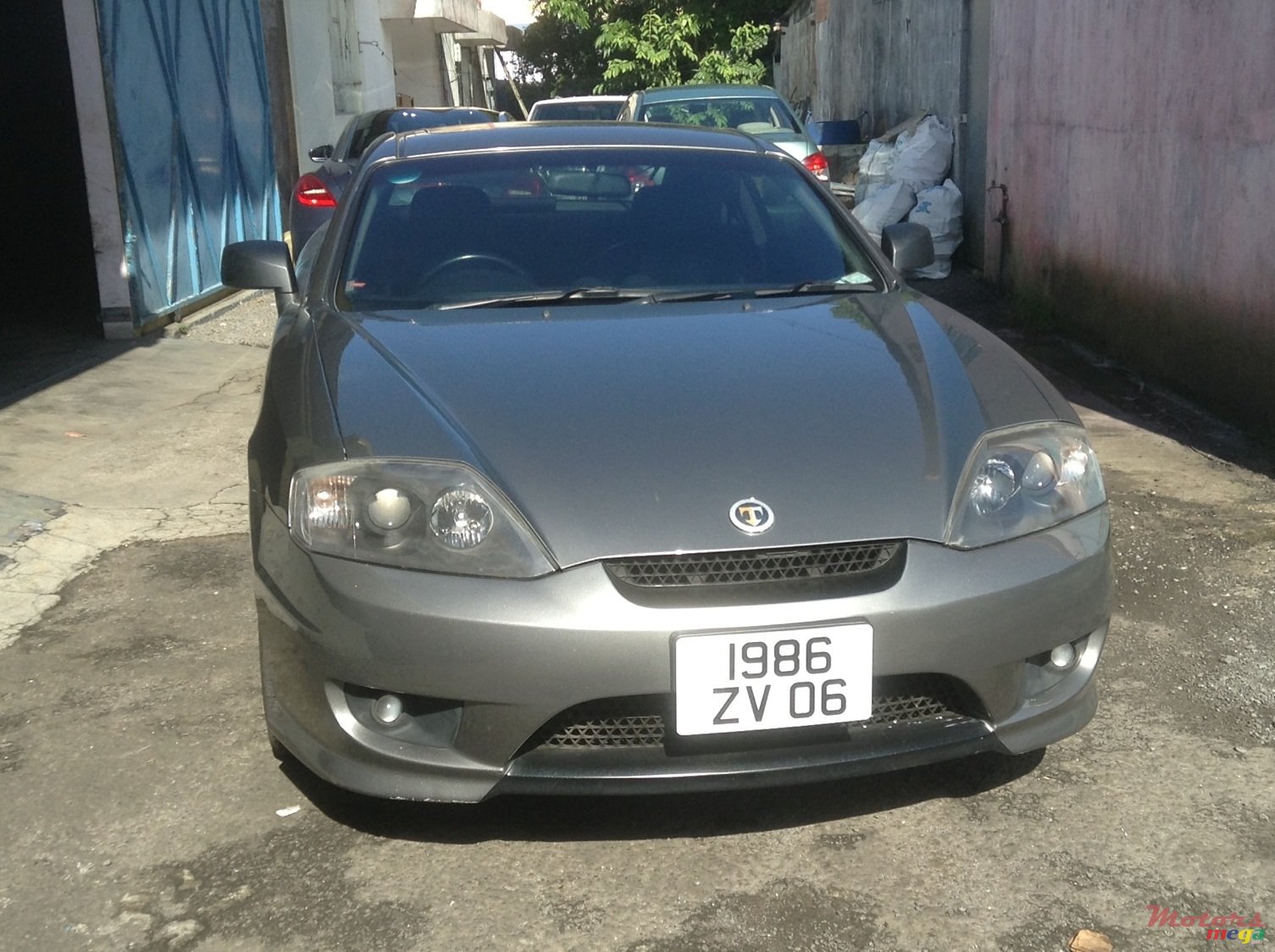 2006' Hyundai Tuscani photo #1