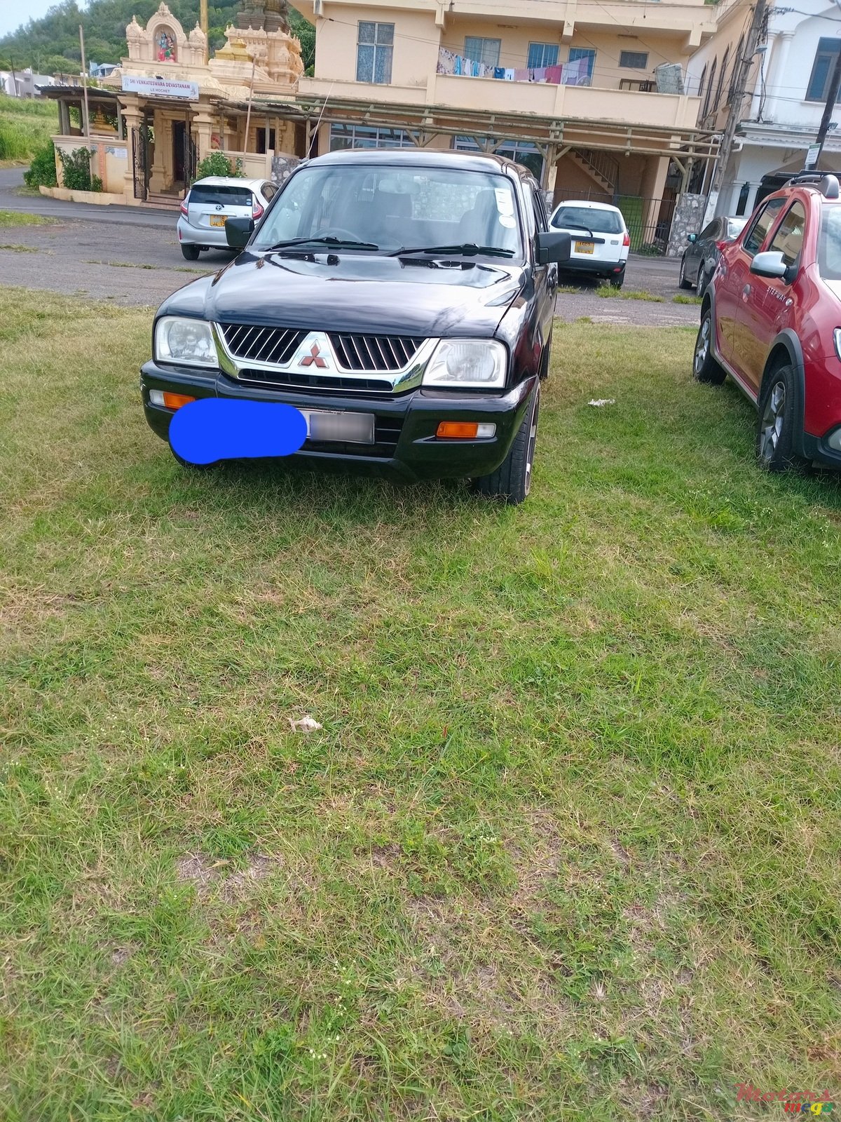 2006' Mitsubishi L200 photo #1