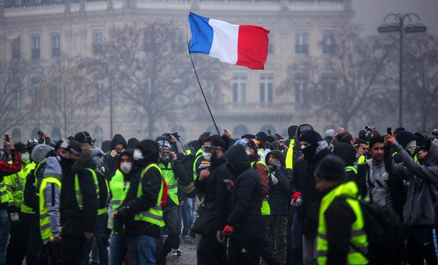 Macron makes U-turn on fuel tax after 'yellow vest' protests