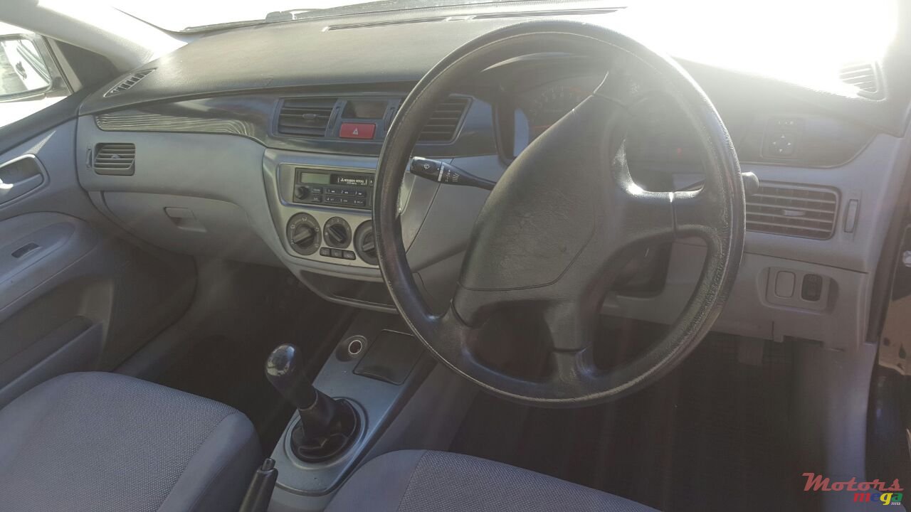 2009' Mitsubishi glx photo #1