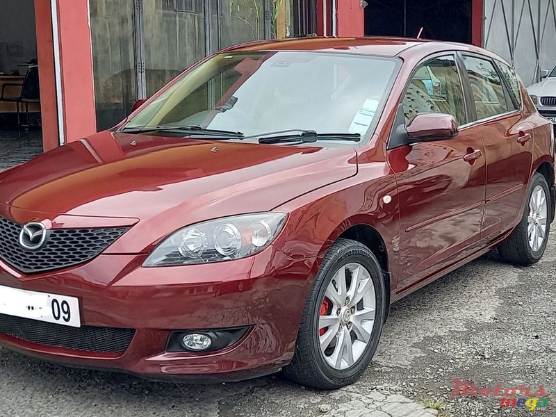 2009' Mazda 3 Hatchback photo #1