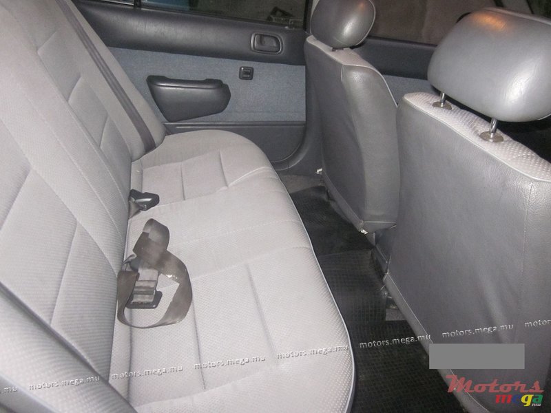 1997' Toyota Corolla EE111 XE saloon photo #5