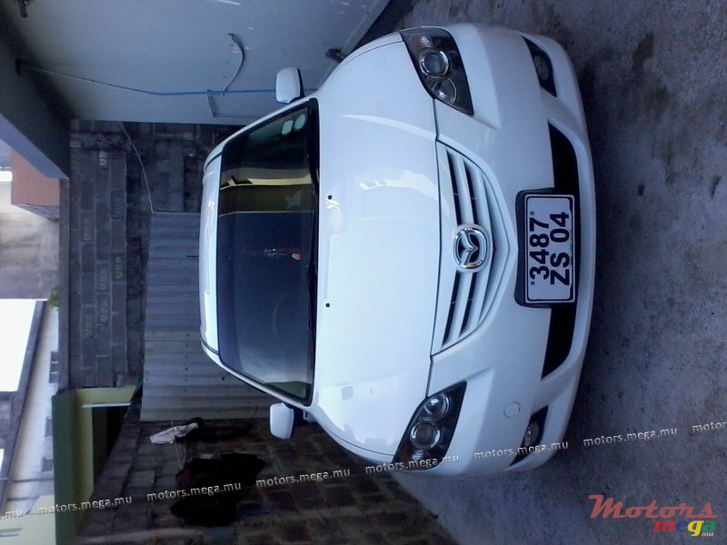 2004' Mazda 3 photo #2