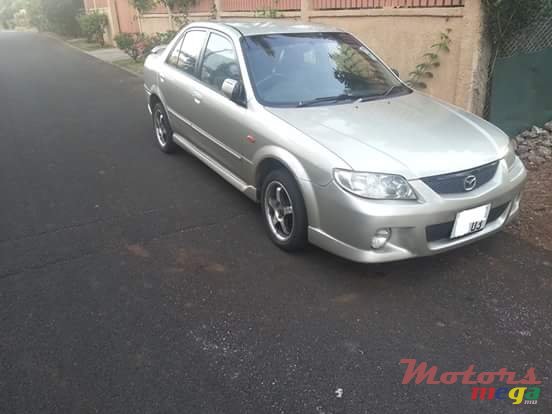 2003' Mazda 323 Body kit photo #1