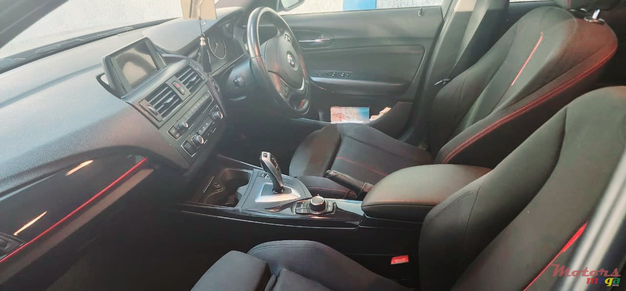 2011' BMW 116 photo #7