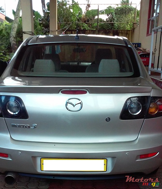 2004' Mazda 3 photo #1