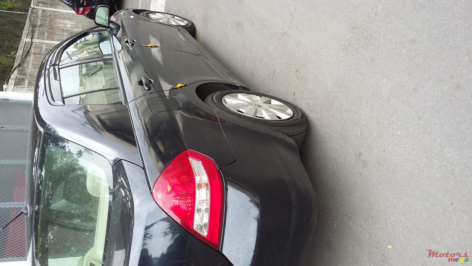 2006' Nissan Tiida photo #1