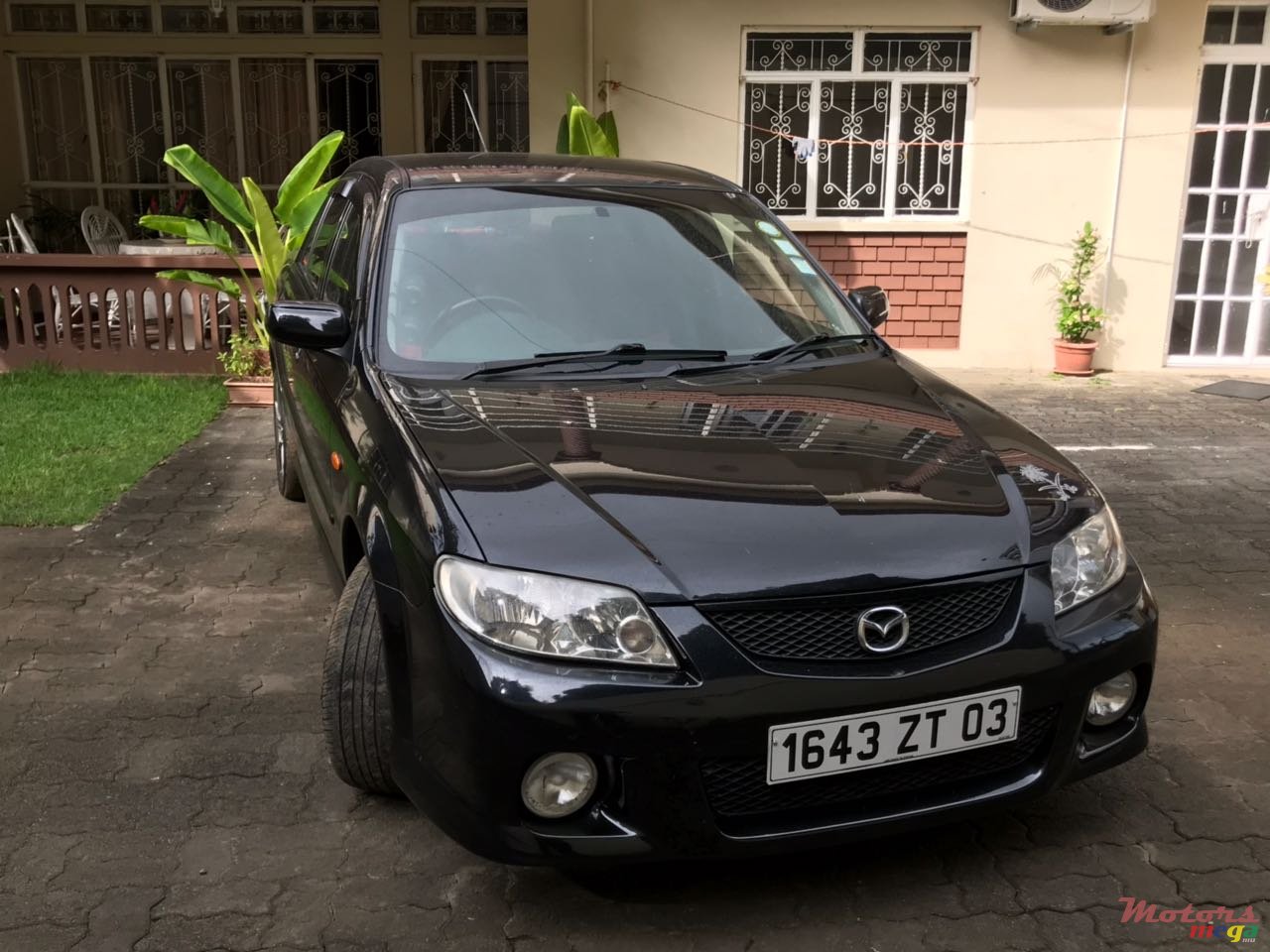 2003' Mazda Protege Origine sport 323 photo #3