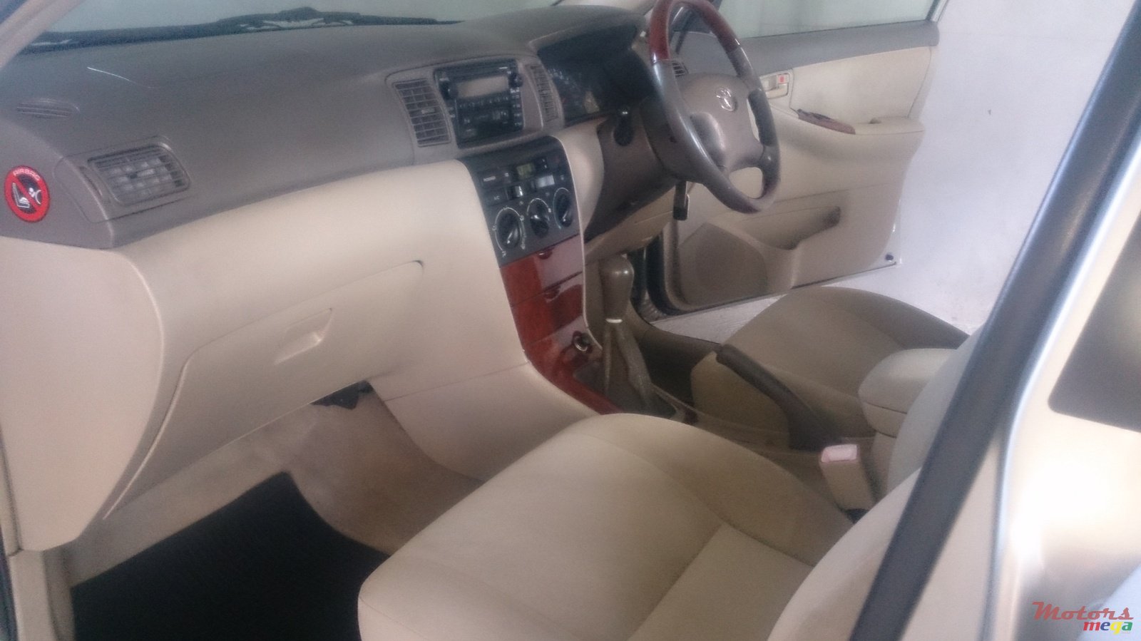 2004' Toyota Corolla nze luxel photo #2