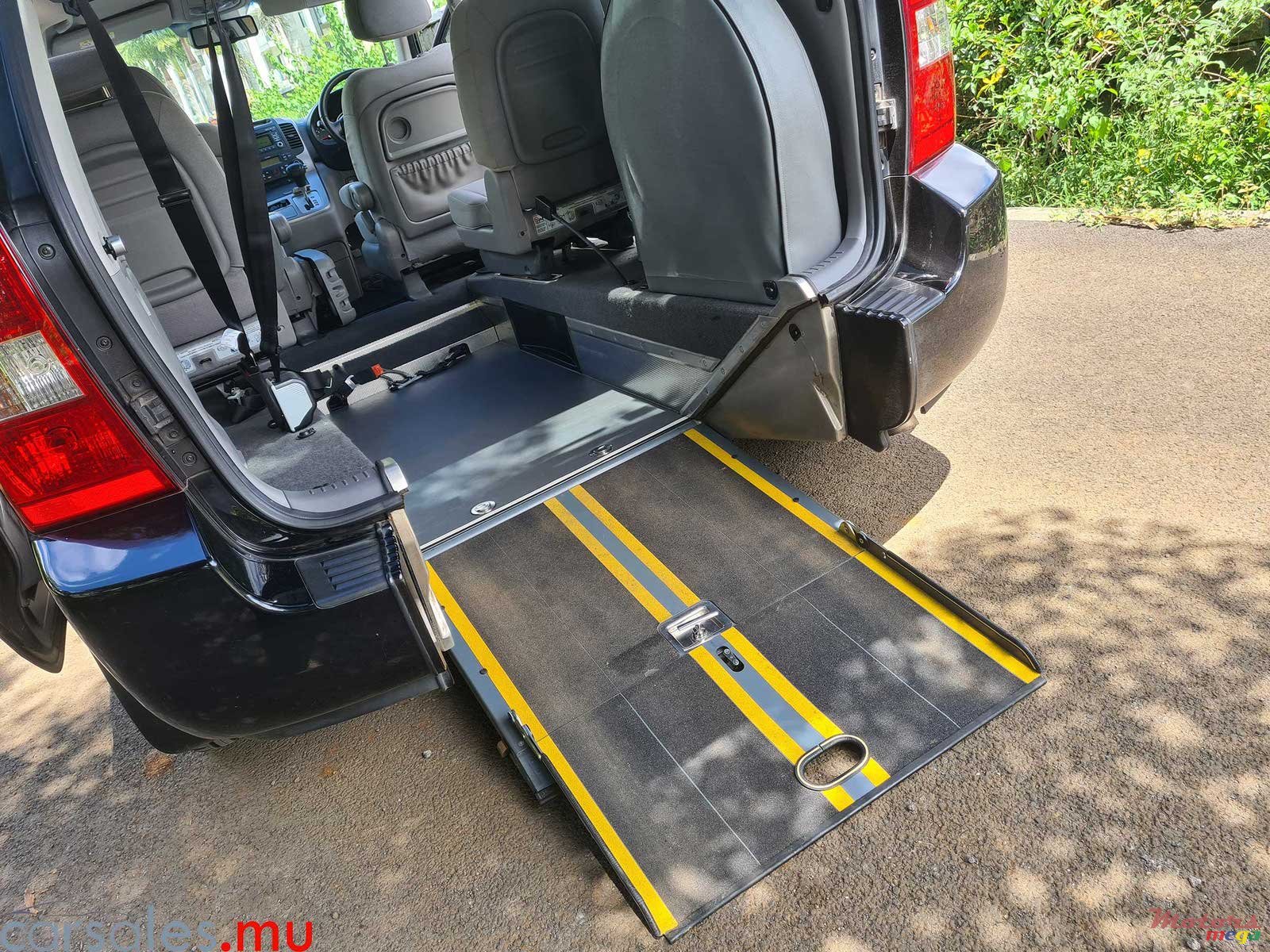 2012' Kia Sedona Wheelchair Accessible Vehicle photo #7