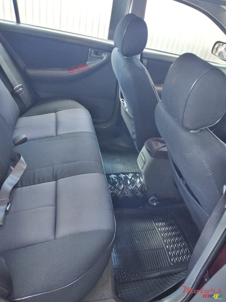 2004' Toyota Corolla NZE photo #7