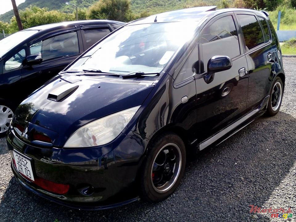 2003' Mitsubishi Colt sport photo #1