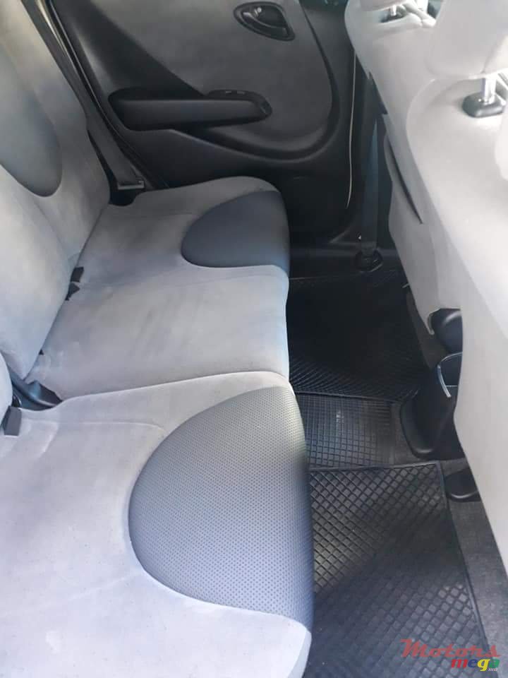 2004' Honda Fit Tinted windows, alloy tires photo #2