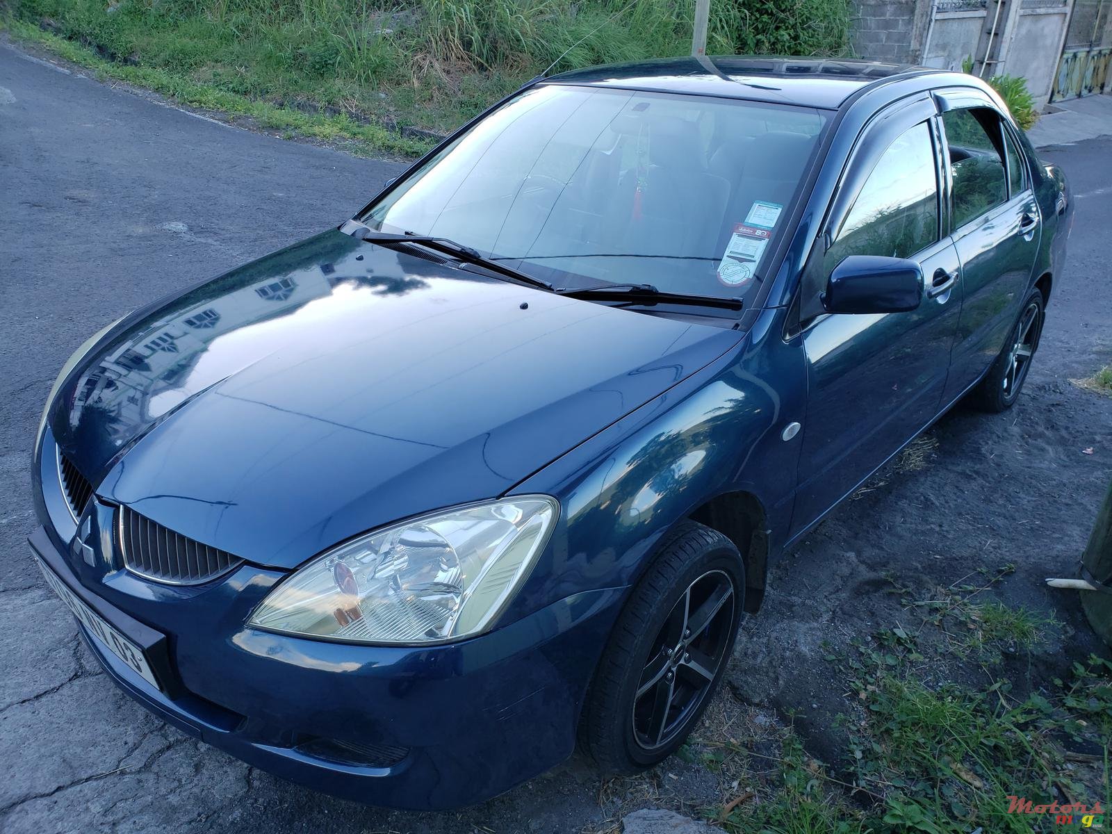 2003' Mitsubishi Lancer GLX photo #1