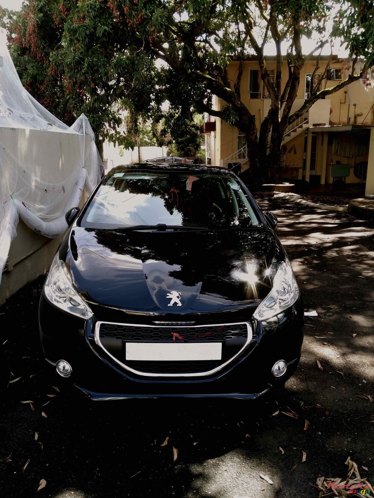 2013' Peugeot 208 photo #1