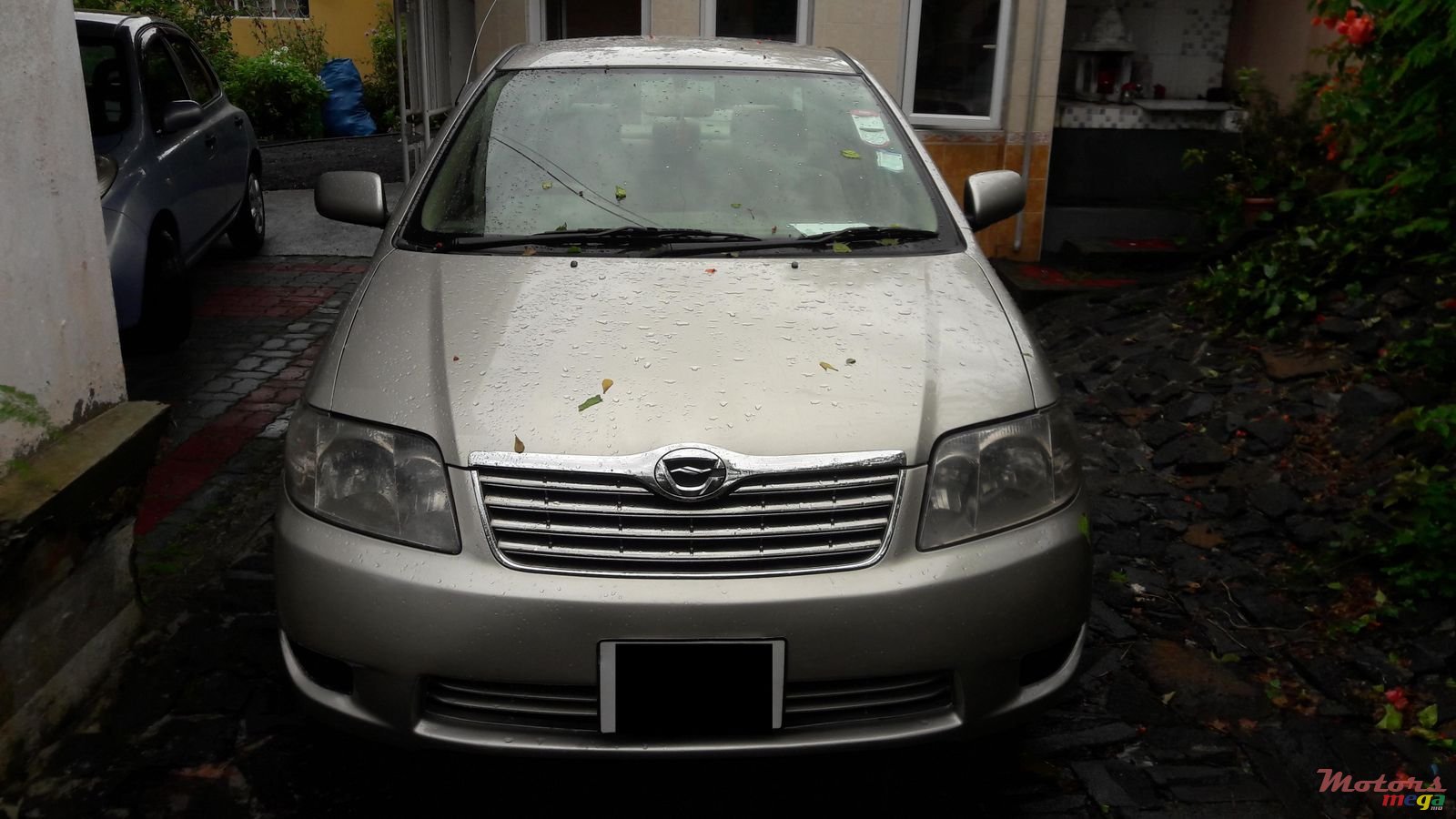 2004' Toyota Corolla NZE Grade X photo #1