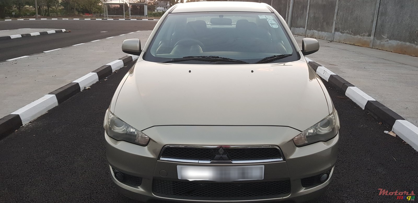 2010' Mitsubishi Lancer Ex photo #1