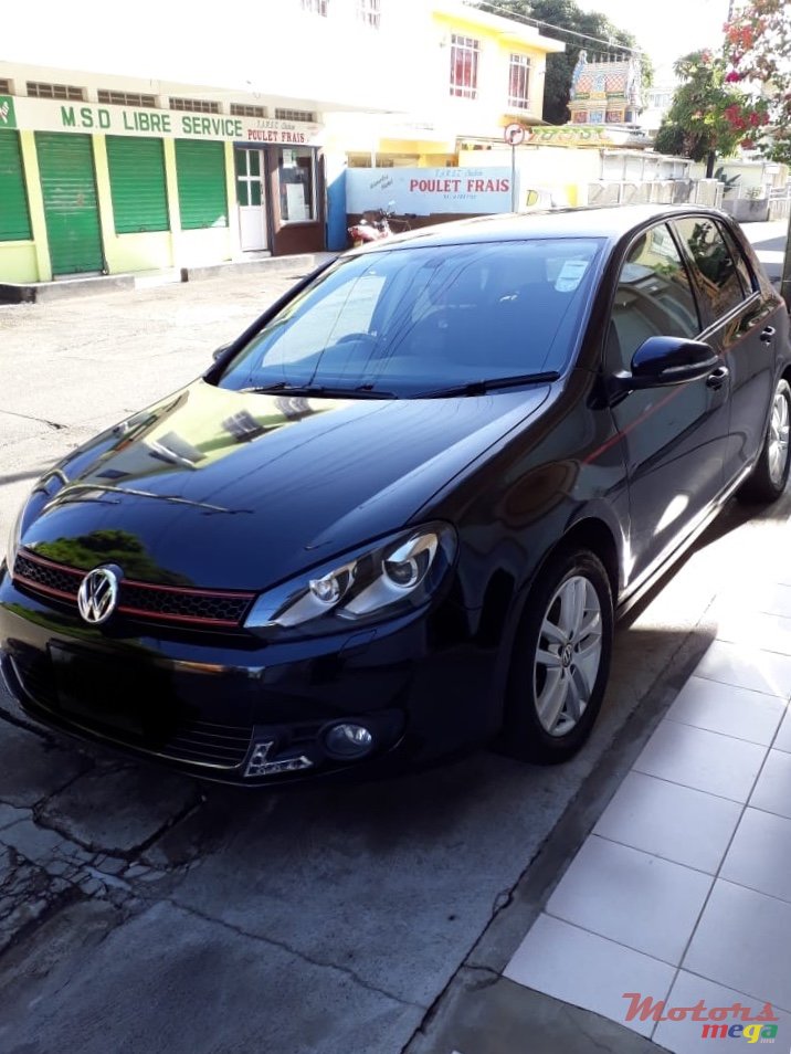 2011' Volkswagen Golf VI photo #1