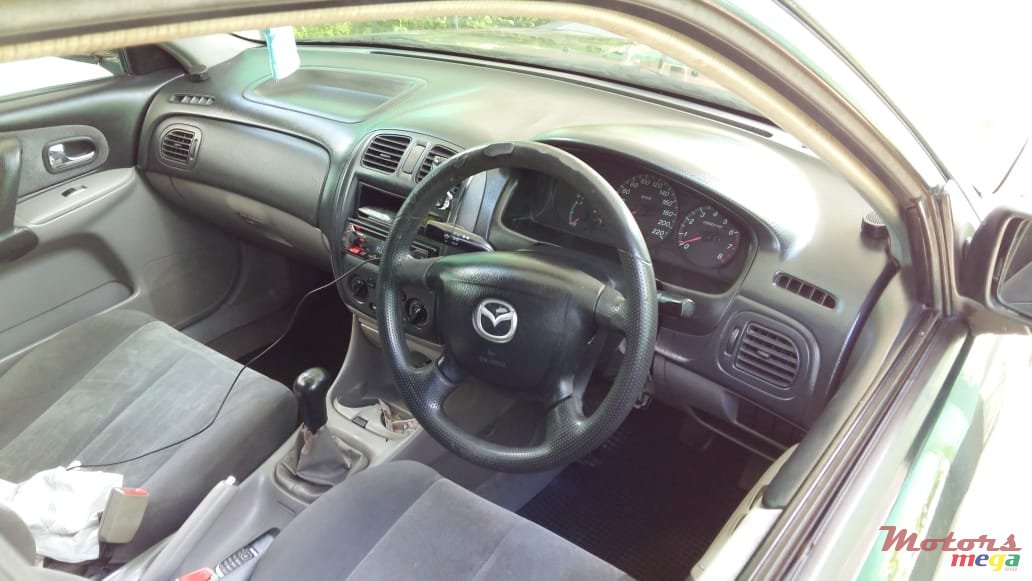 2002' Mazda 323 photo #2