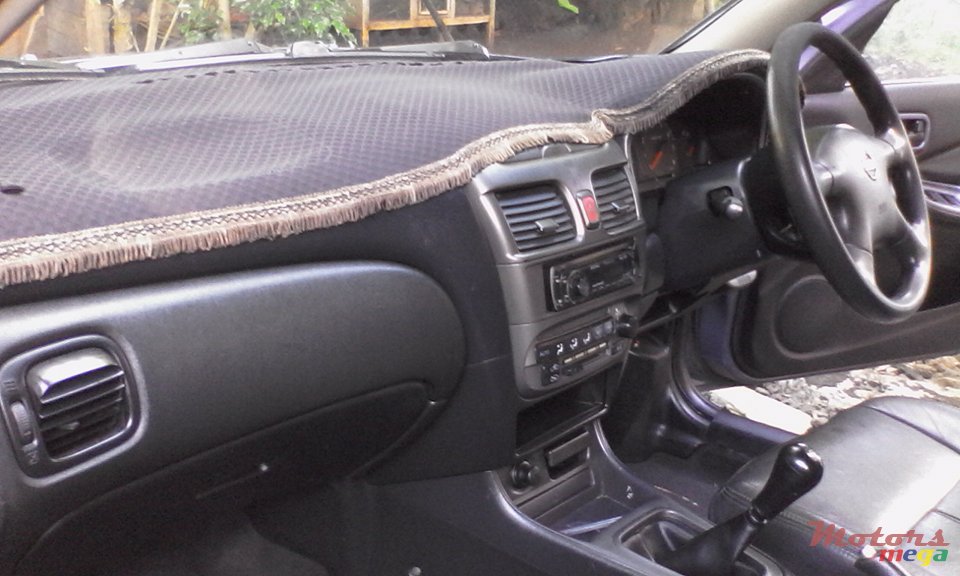 2004' Nissan Sunny photo #3