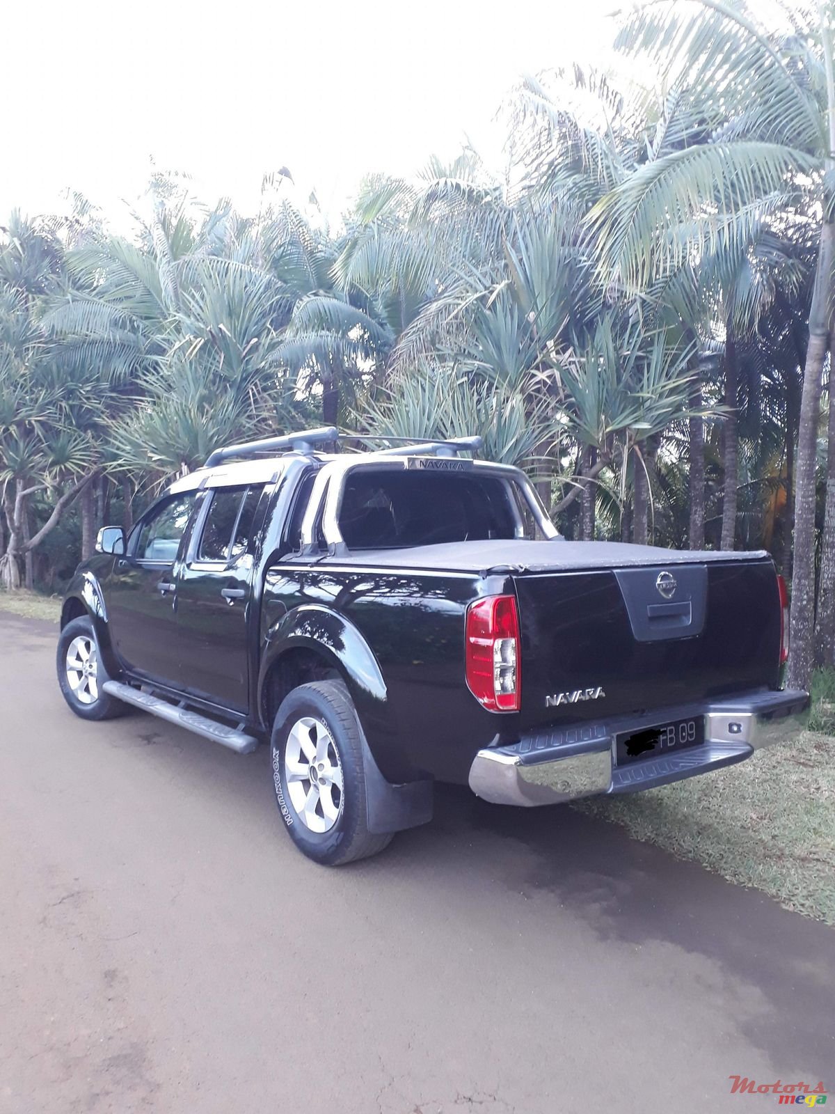2009' Nissan Navara 2.5 turbo photo #2
