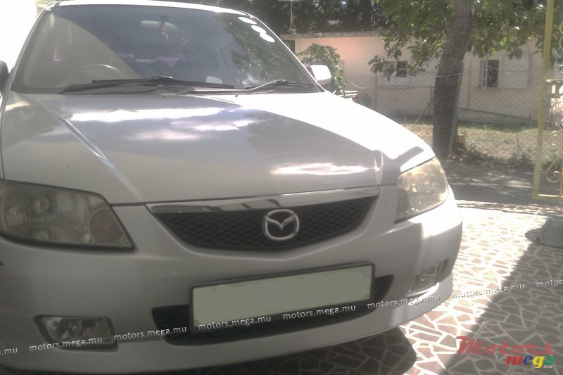 2003' Mazda 323 photo #1