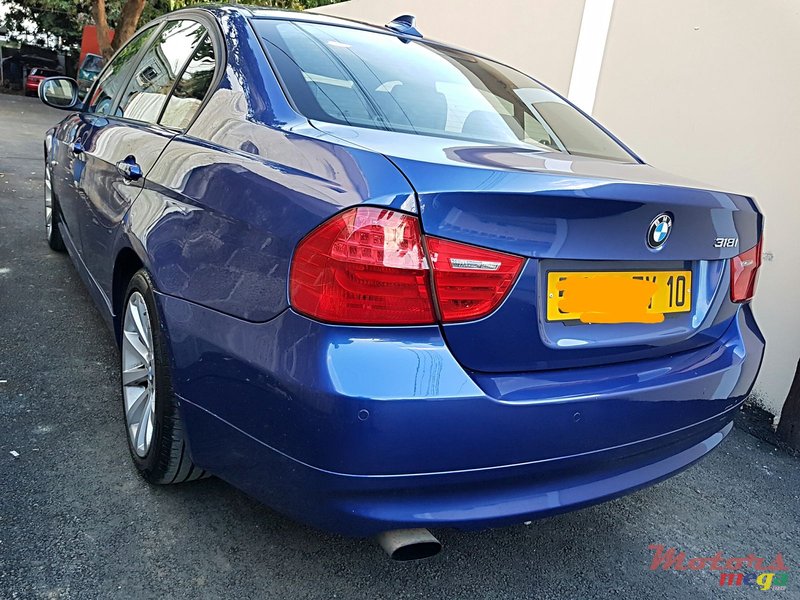 2010' BMW 318 idrive auto photo #2