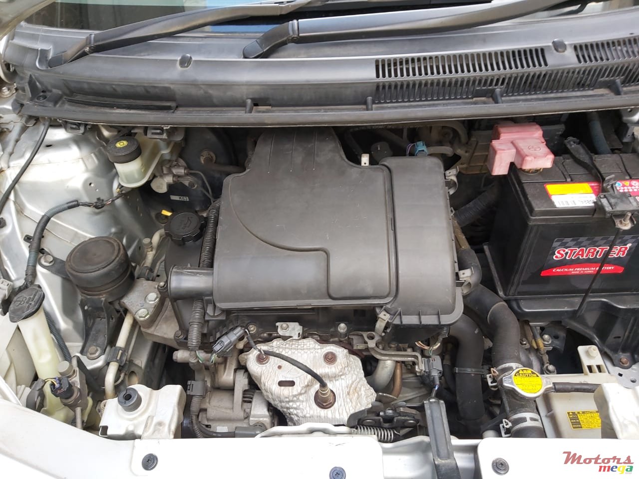 2006' Toyota Belta photo #3