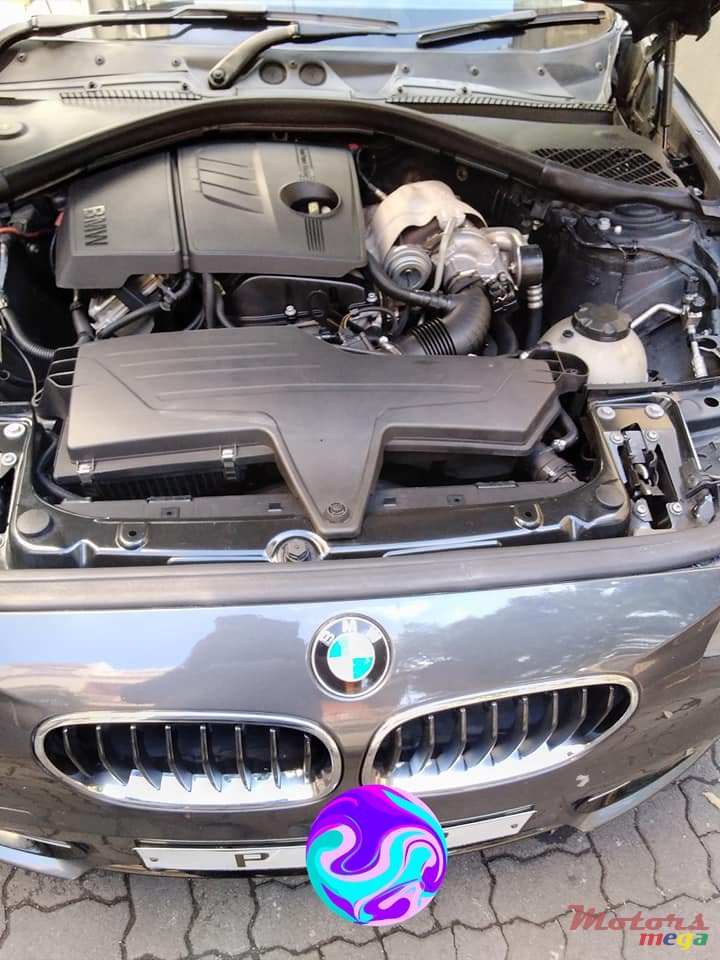 2011' BMW 116 photo #7