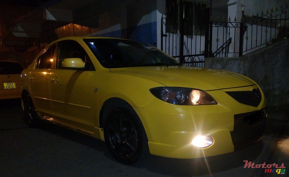 2004' Mazda 3 photo #2