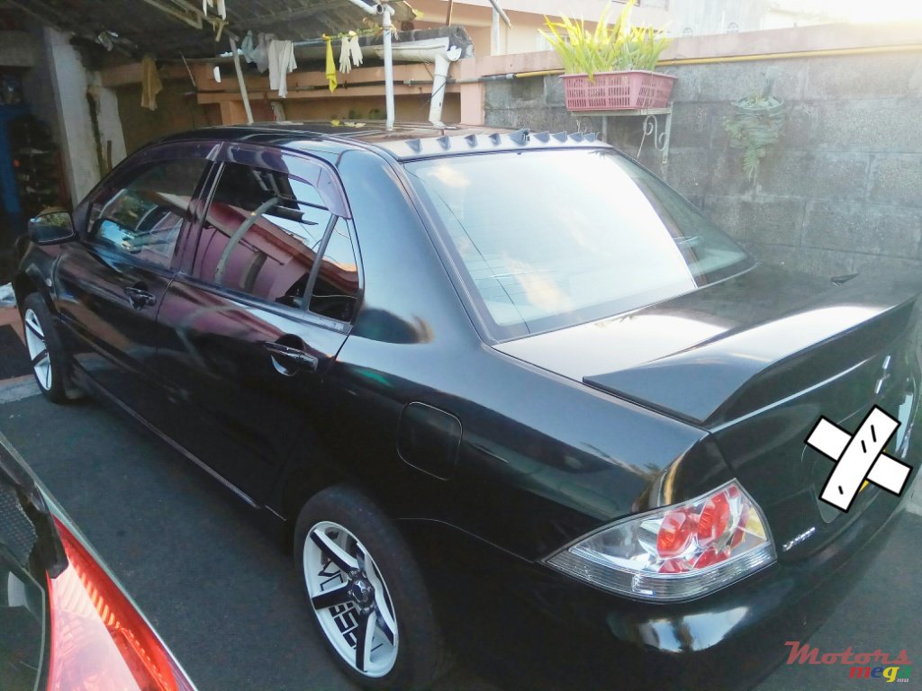 2003' Mitsubishi Lancer photo #6