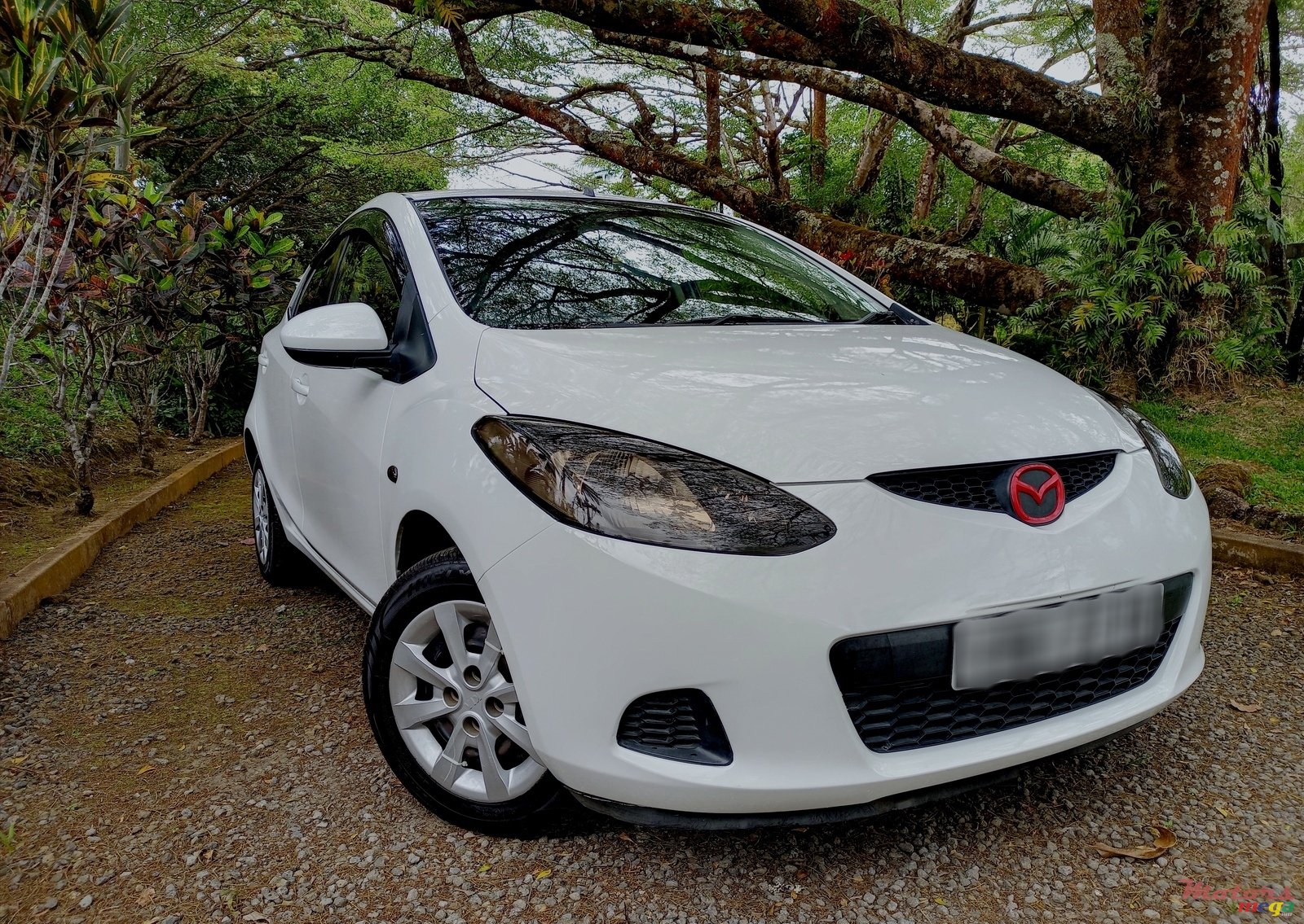 2009' Mazda Demio photo #1